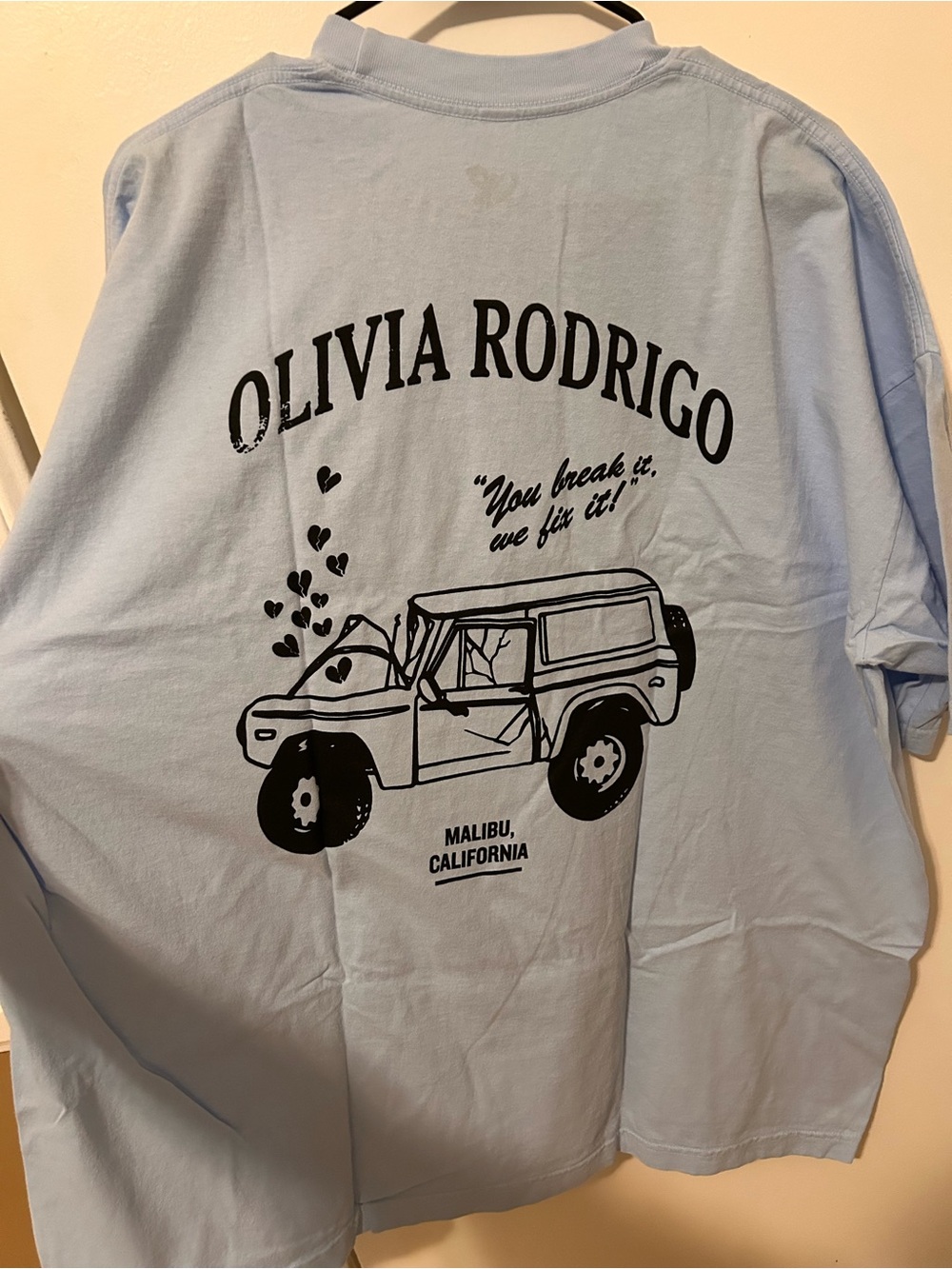 OP Light Blue Tee with Black Butterfly Logo